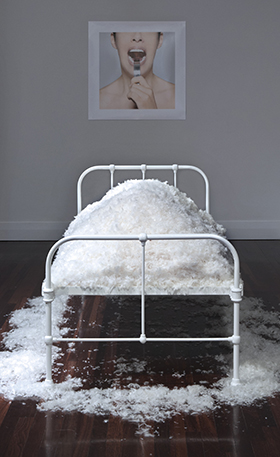 Eva Fernández, Narcosis, 2012. Cast iron bed and white goose down, dimensions variable. Image courtesy of the artist