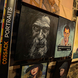View of Portrait Category, including on far left, Wise Eyes by Katherine Brown, Winner, People's Choice Award, 2015 Cossack Art Awards. Image: Pilbara 